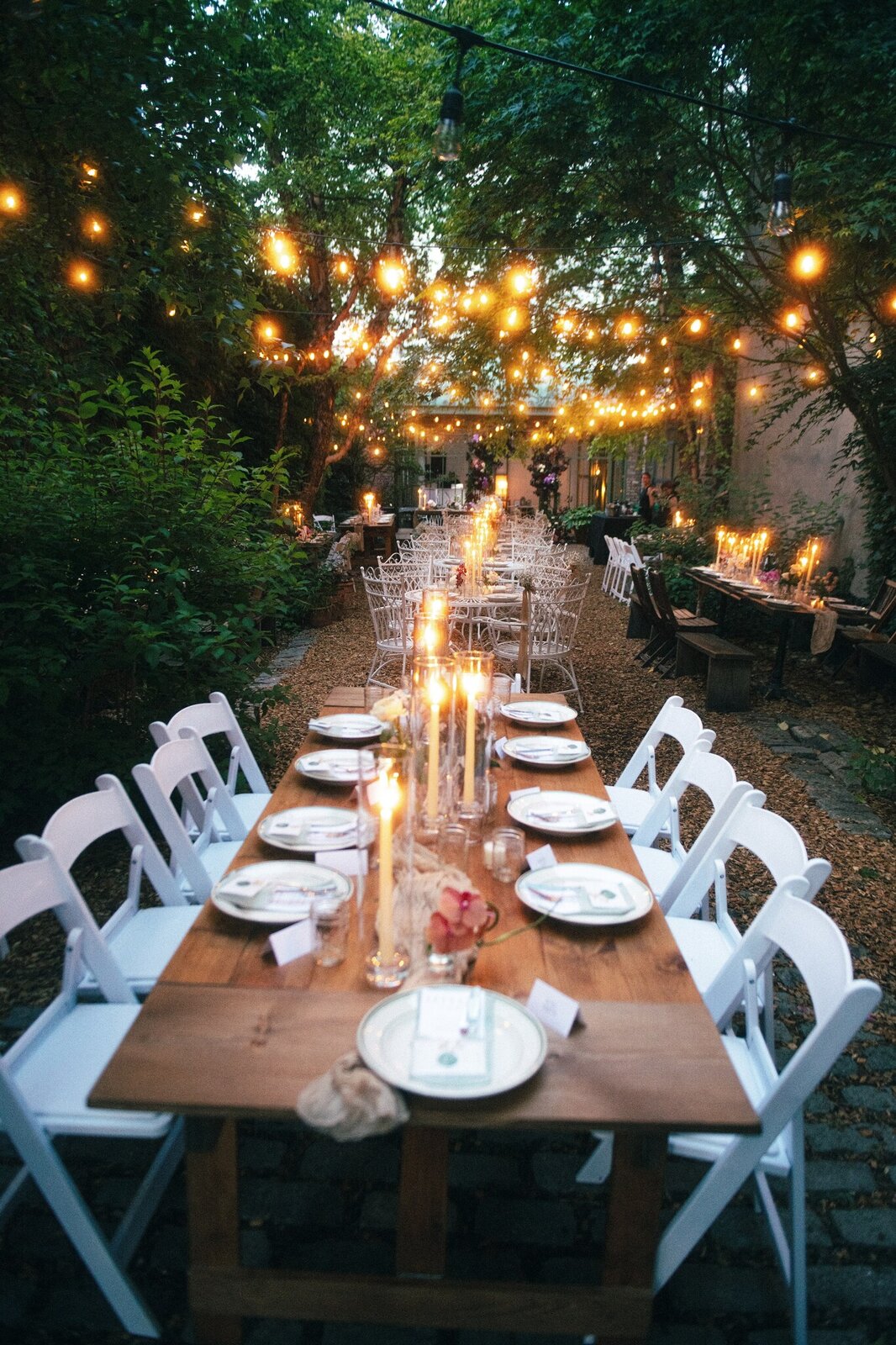 Wooden Farm Tables for Garden Wedding Reception at Milk and Roses Bistro in Greenpoint Brooklyn